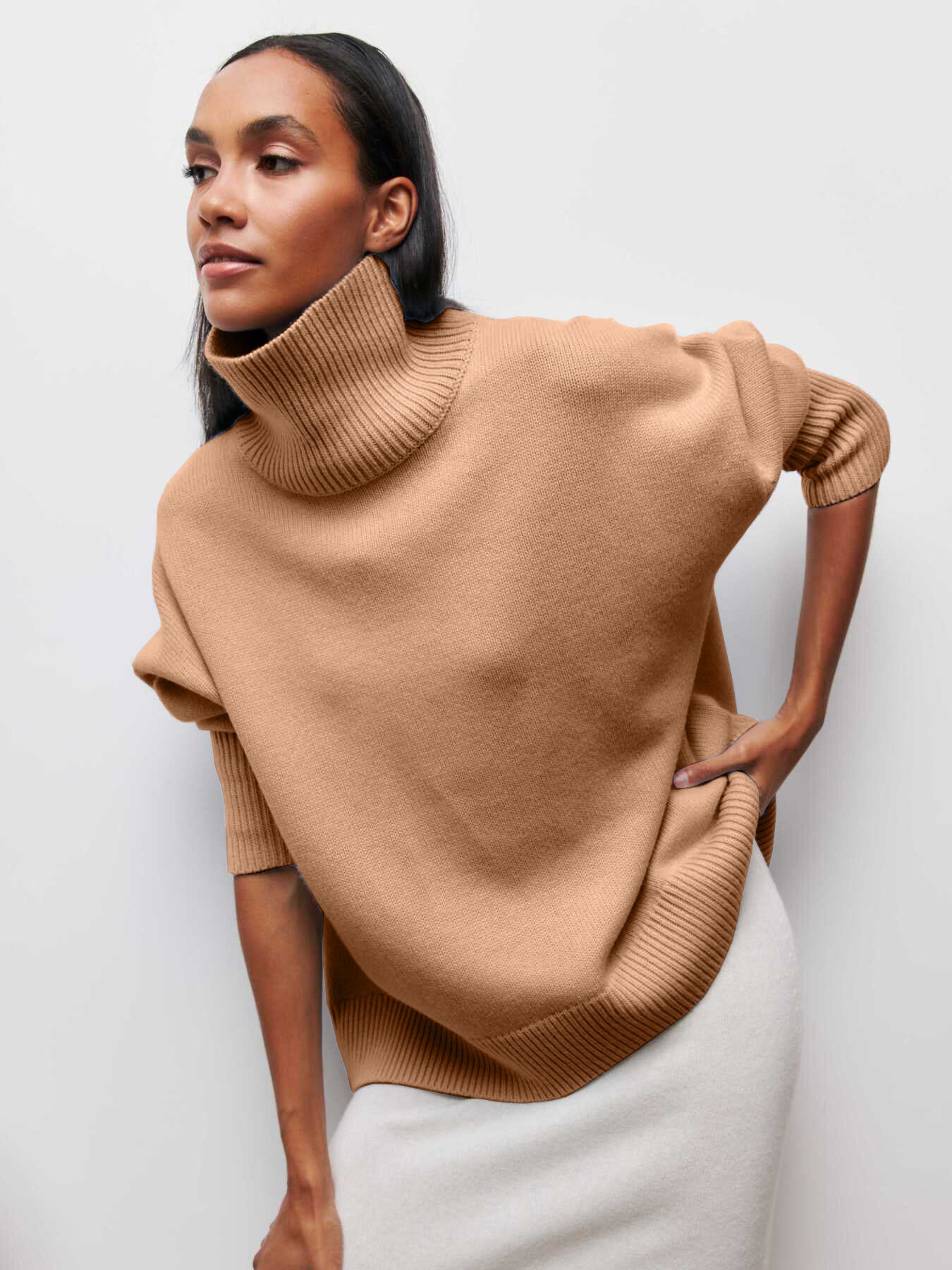 Oversized jumper with high collar and ribbed finish