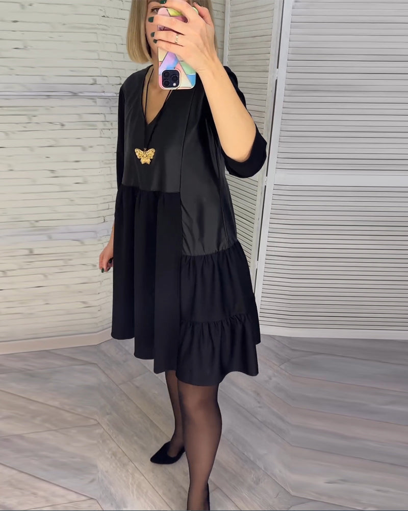Dress with V-neck and patchwork