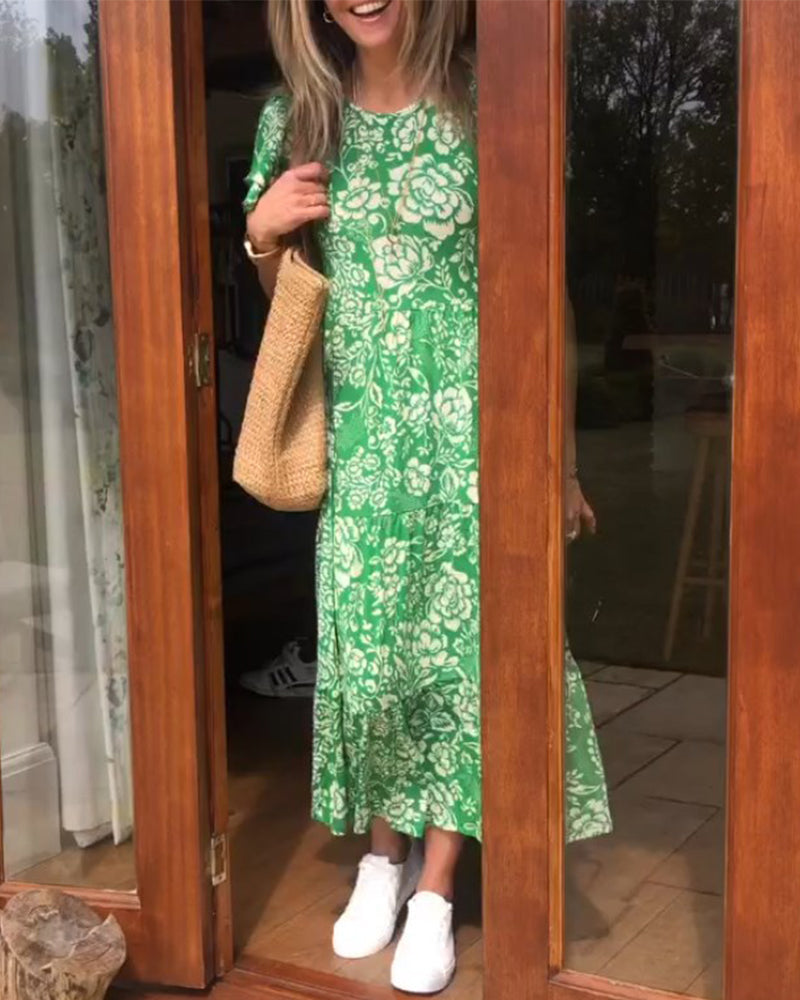 Long dress with short sleeves and a floral print