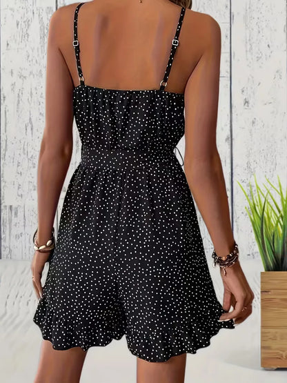 Playsuit with polka dots and V-neck