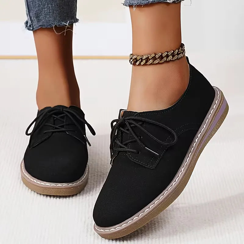 Loafers with brogue and laces