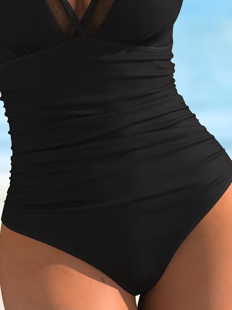 Swimsuit with V-neck and mesh details