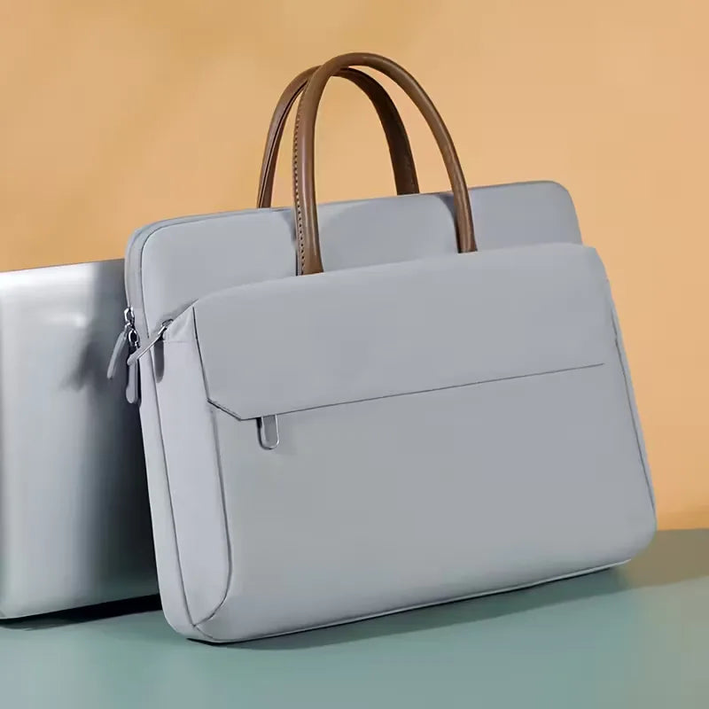 Laptop bag with front pocket and zip