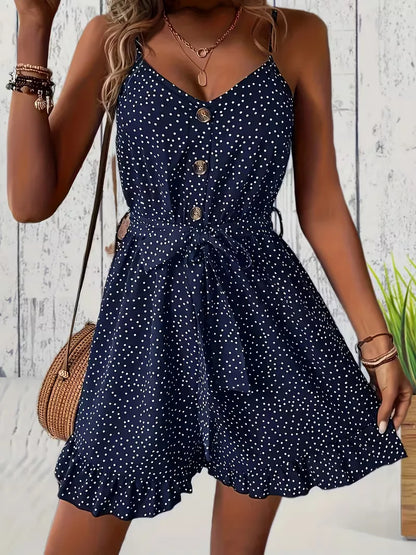 Playsuit with polka dots and V-neck