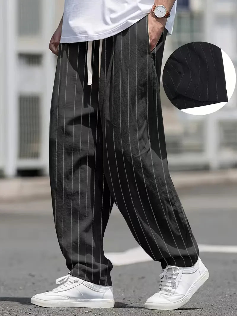 Wide fit trousers with vertical stripes