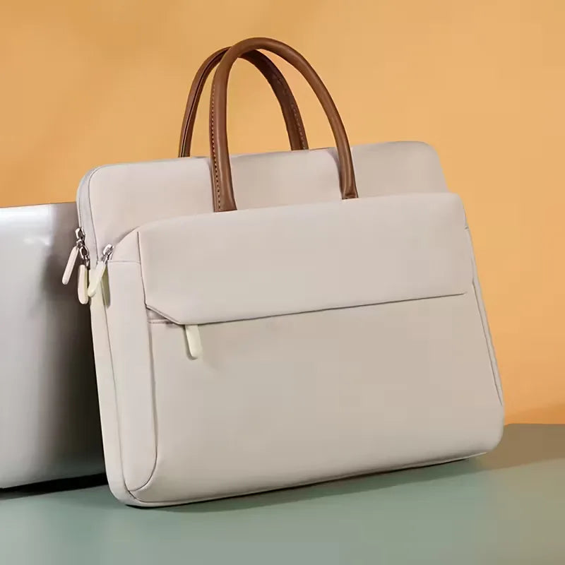 Laptop bag with front pocket and zip