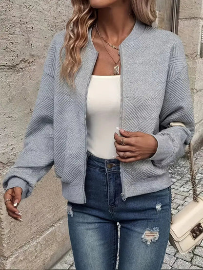 Bomber jacket with geometric pattern and round neck