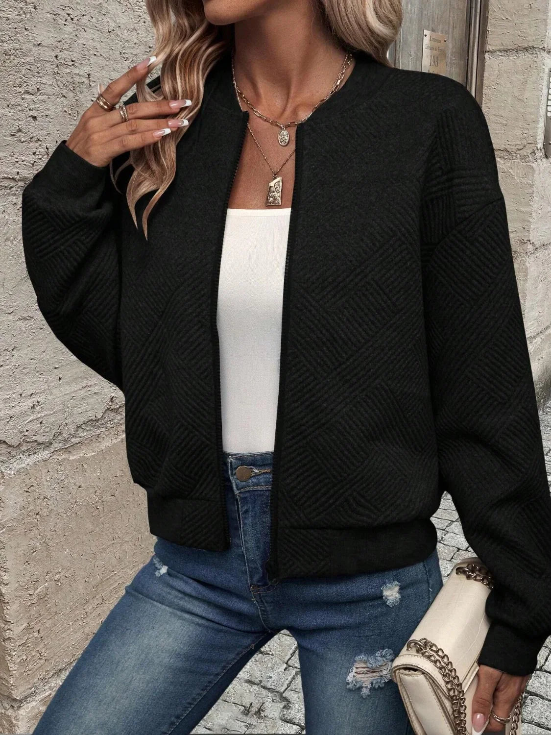 Bomber jacket with geometric pattern and round neck
