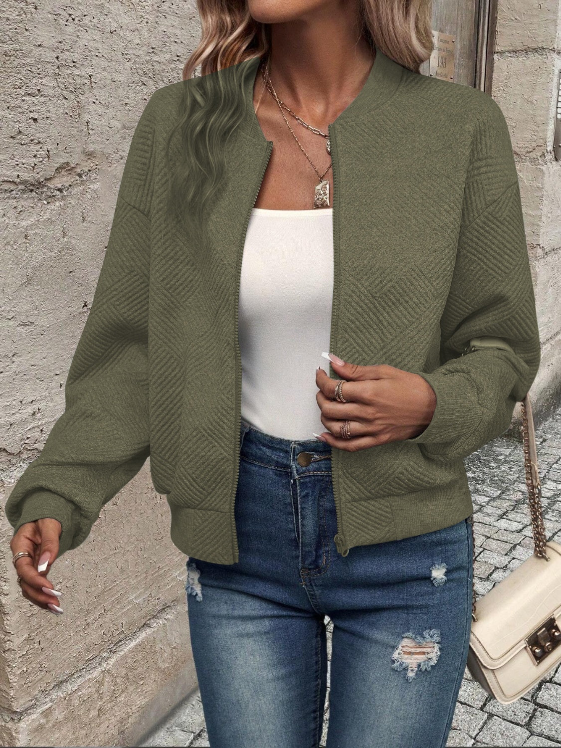 Bomber jacket with geometric pattern and round neck