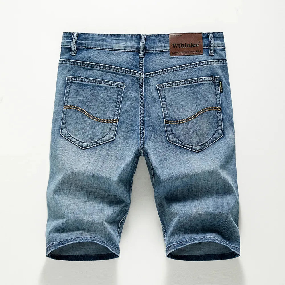 Denim shorts with zip and button closure