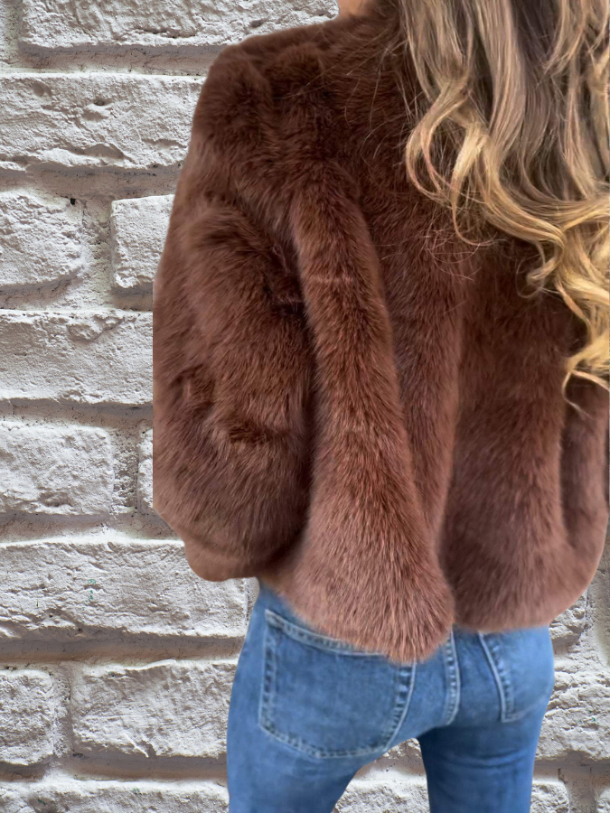 Fluffy jacket with high collar and zip