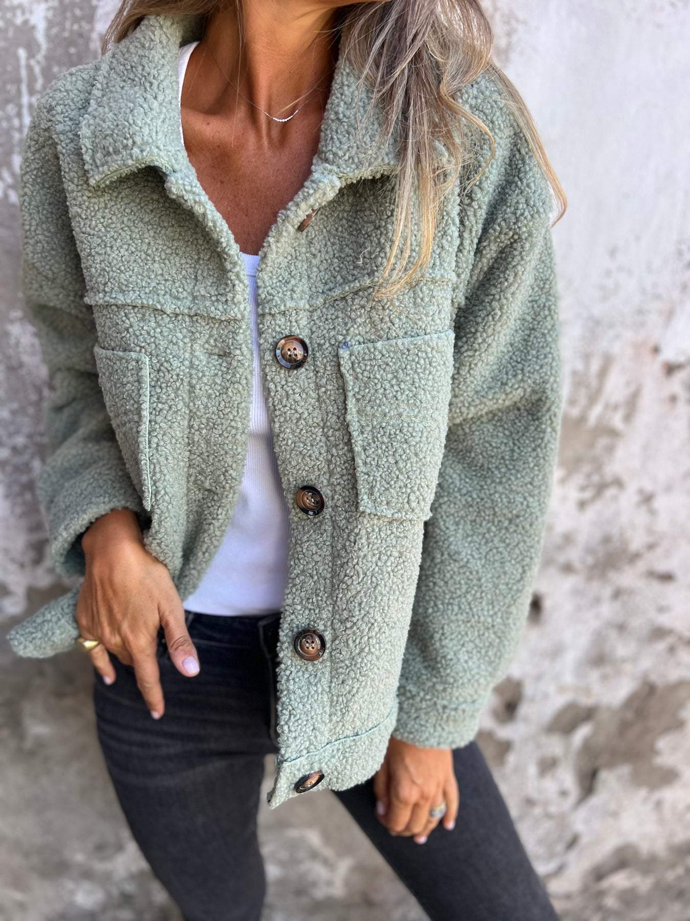 Fluffy coat with classic collar and patch pockets
