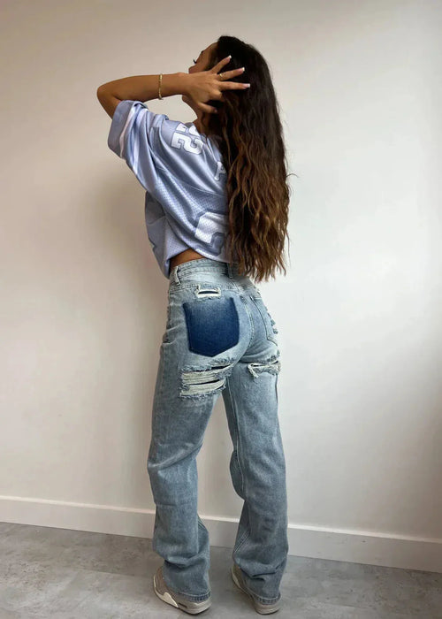 High waist jeans with ripped details