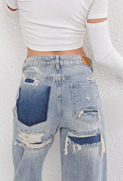 High waist jeans with ripped details