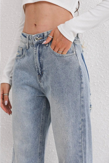 High waist jeans with ripped details