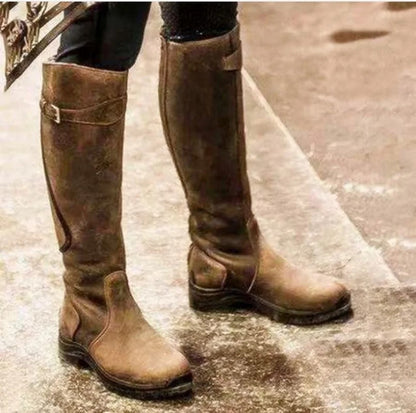 High model boots with buckle closure