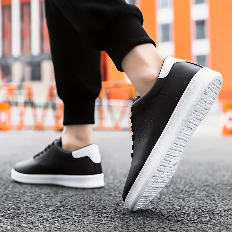 Low skate shoes with lace-up fastening and perforations