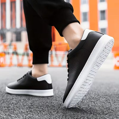 Low skate shoes with lace-up fastening and perforations