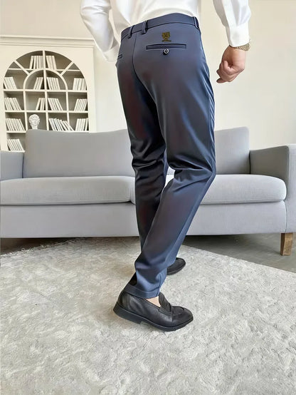 Long trousers with tiger embroidery design and slim fit