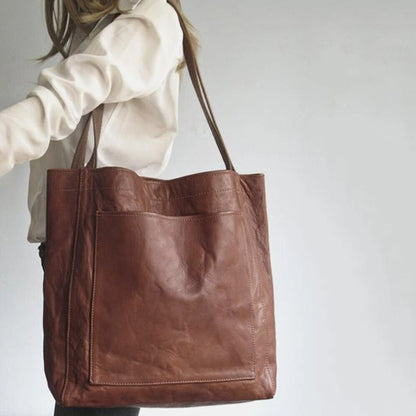 Leather bag with stain-resistant interior and zippered inner pocket
