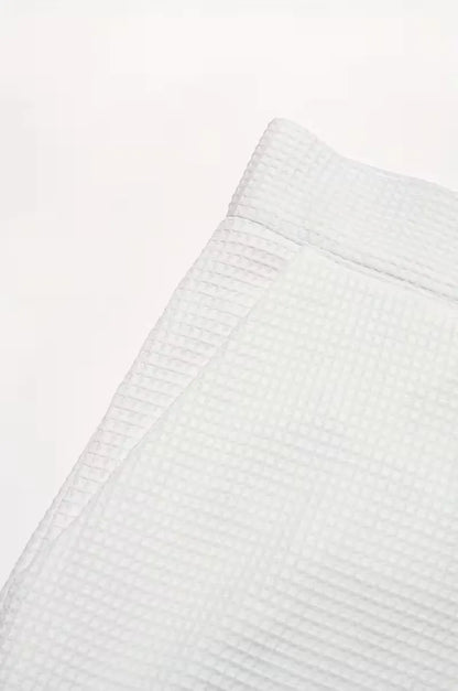 Lightweight fabric trousers with straight legs and side pockets
