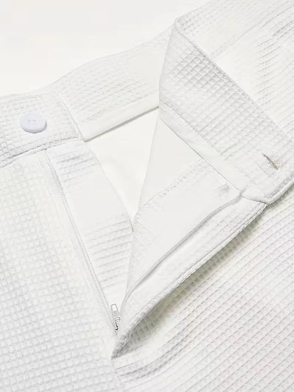 Lightweight fabric trousers with straight legs and side pockets