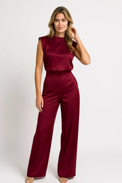 Sleeveless jumpsuit with luxurious satin look and wide legs