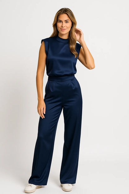 Sleeveless jumpsuit with luxurious satin look and wide legs