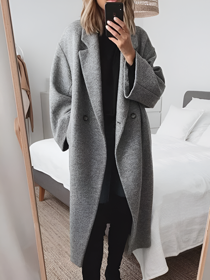 Oversized coat with double-breasted fastening