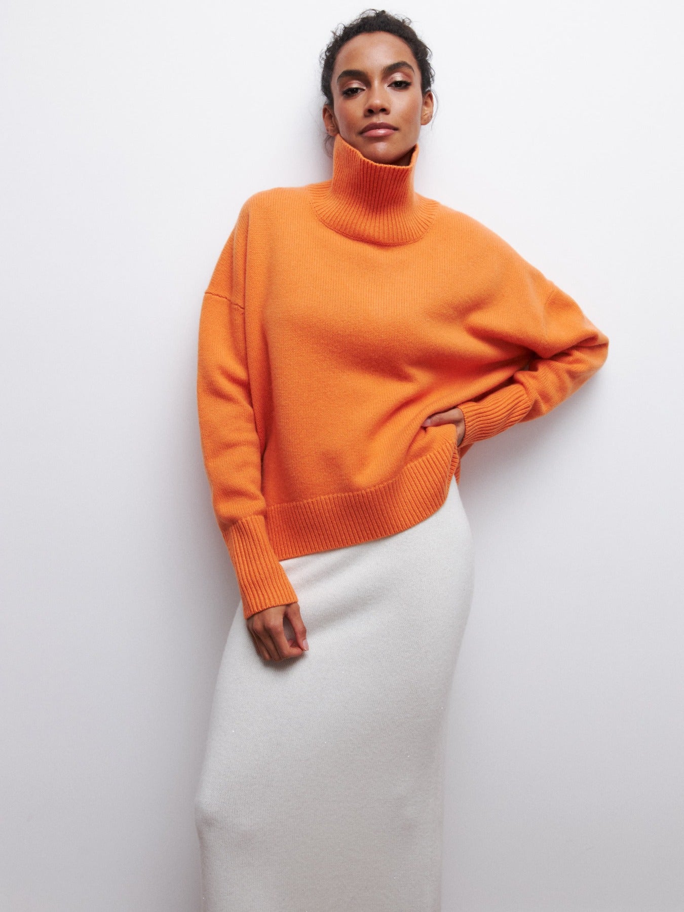 Oversized jumper with high collar and ribbed finish