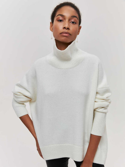 Oversized jumper with high collar and ribbed finish