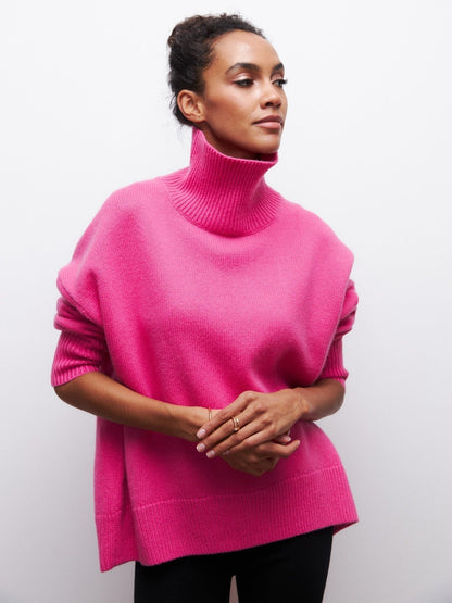 Oversized jumper with high collar and ribbed finish