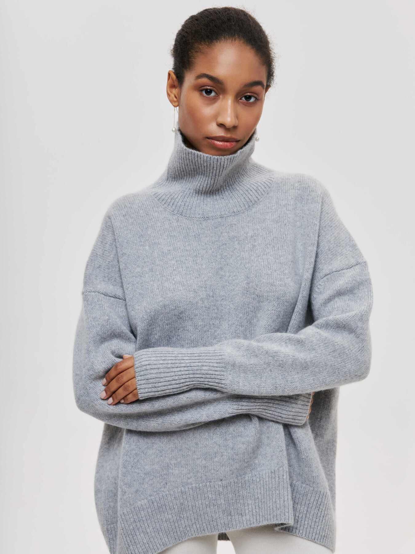 Oversized jumper with high collar and ribbed finish