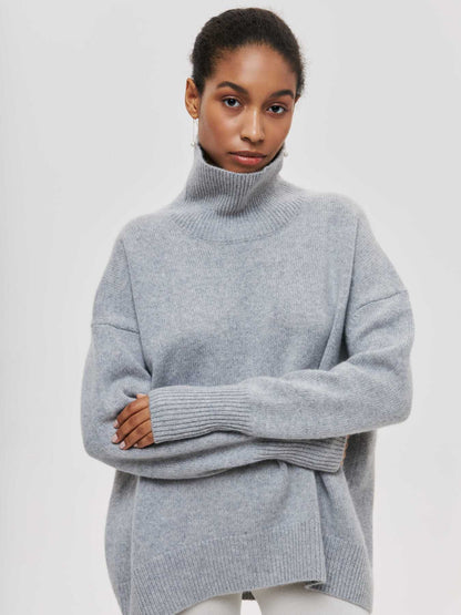 Oversized jumper with high collar and ribbed finish