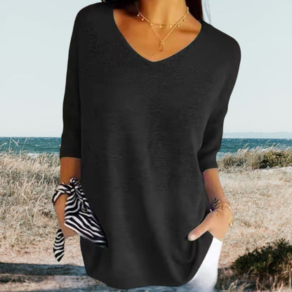 Top with V-neck and three-quarter sleeves
