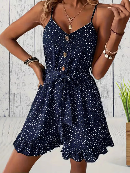 Playsuit with polka dots and V-neck