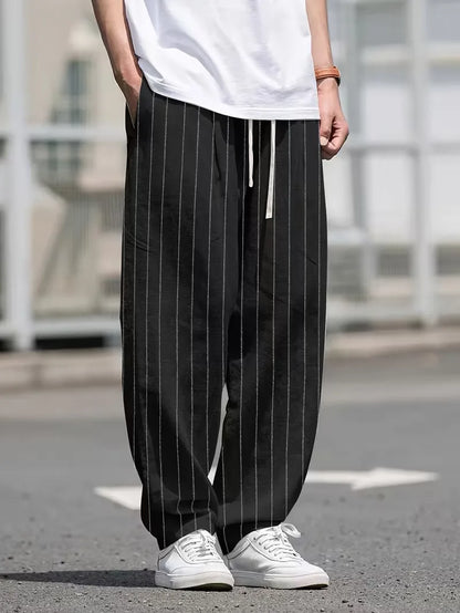 Wide fit trousers with vertical stripes
