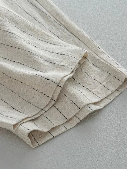 Wide fit trousers with vertical stripes
