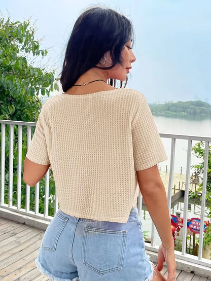 Beige crop top with V-neck
