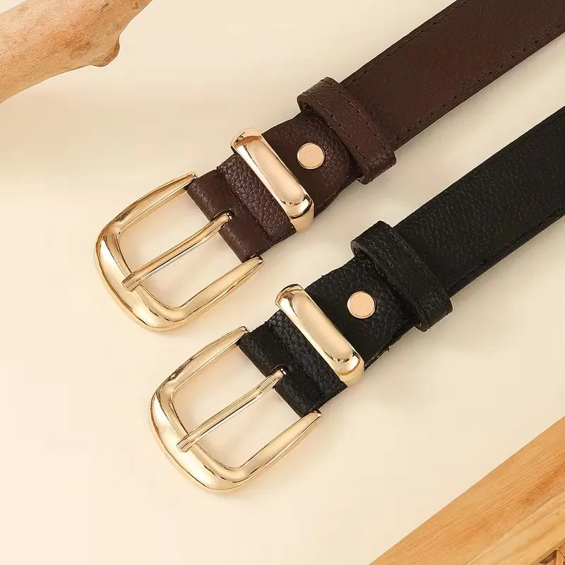 Narrow belt with gold buckle