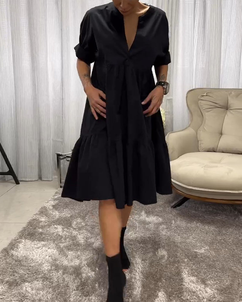 Dress with 3/4 Sleeves and Deep V-Neck