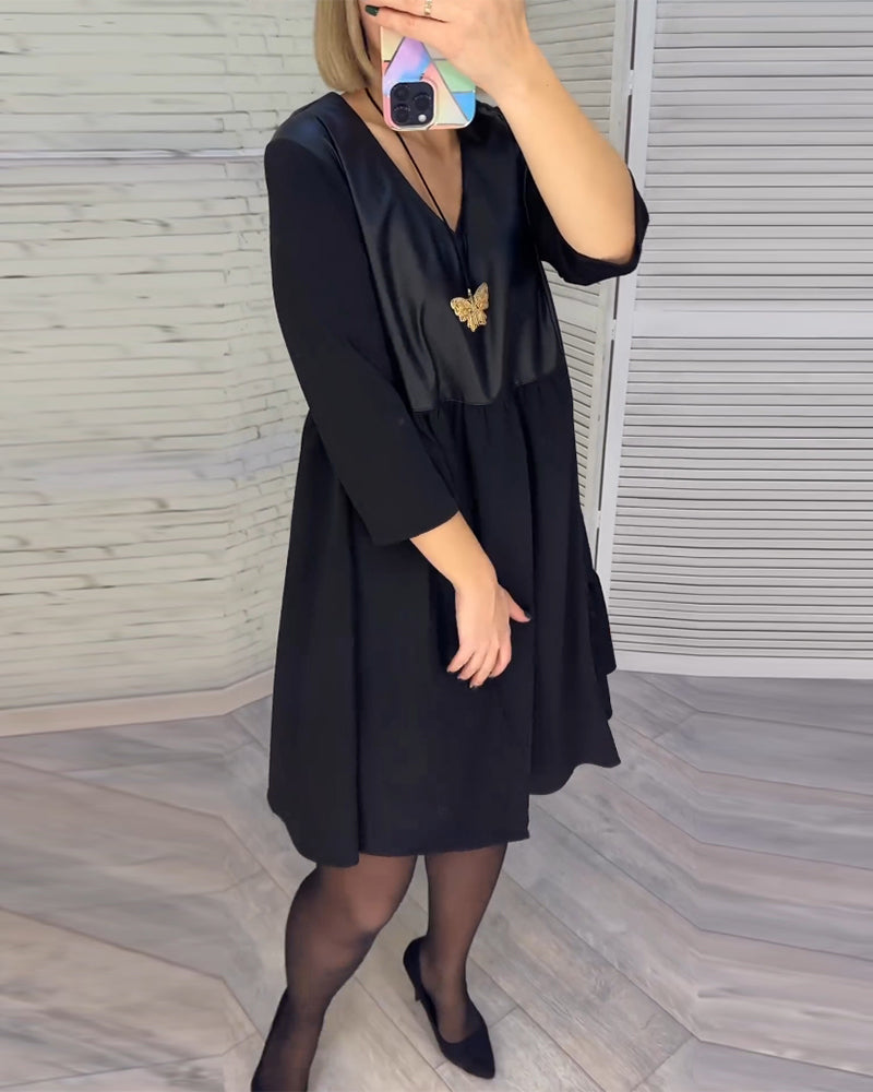 Dress with V-neck and patchwork
