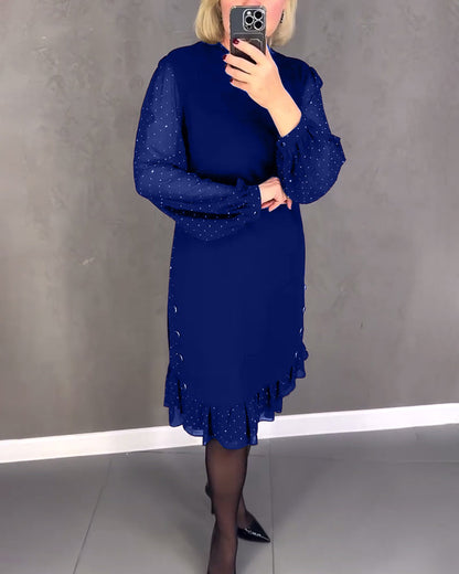 Long-sleeved elegant dress with polka dots