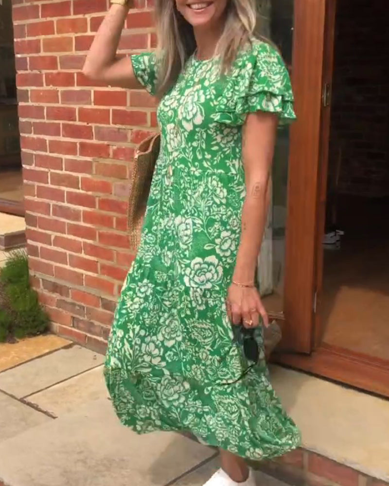 Long dress with short sleeves and a floral print