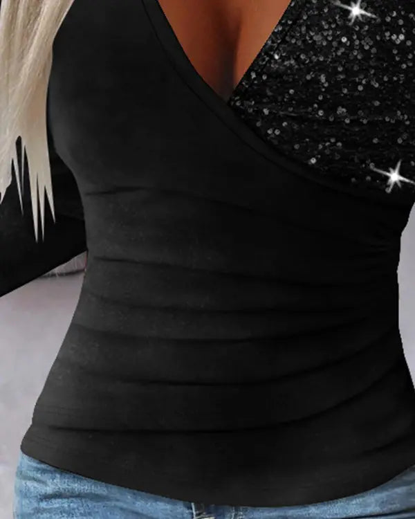 Overlaptop with contrasting sequins and ruffles