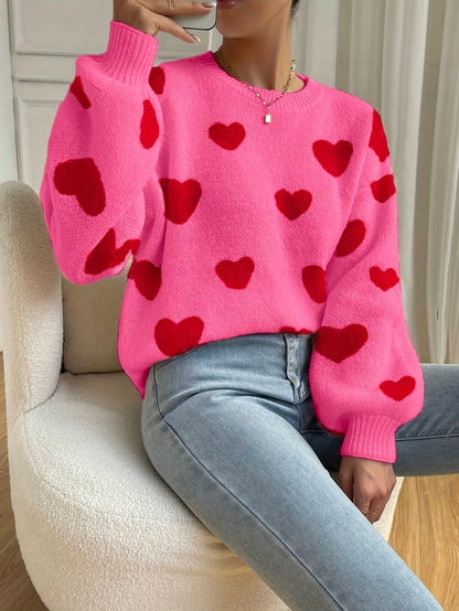 Sara | Pink jumper with red heart pattern and round neck