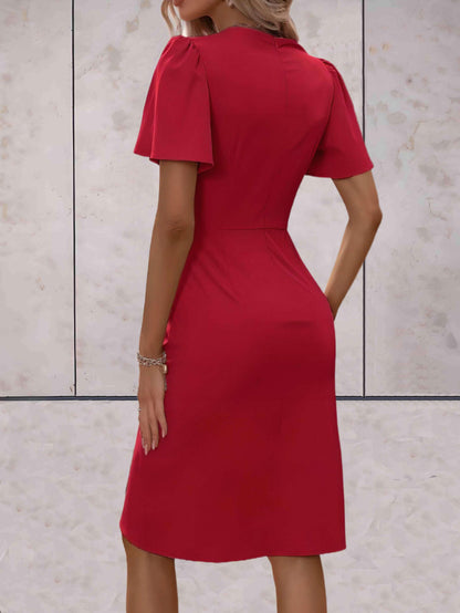 Sophie | Fitted dress with V-neck and wrap